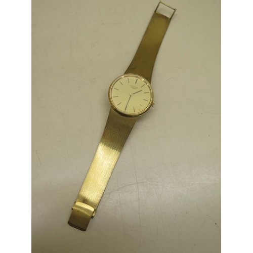 220 - A Longines gold plated manual wind wristwatch with later added 14ct gold bracelet strap - 33mm case ... 