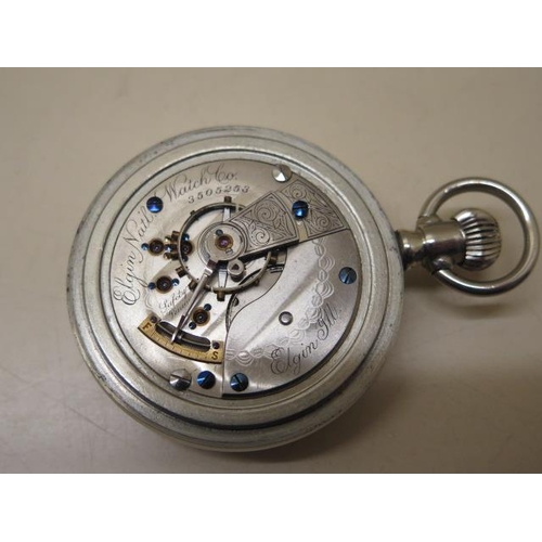 233 - An Elgin Railway Watch 58mm case - ticks but stops and a silver pocket watch - 36mm case - not runni... 