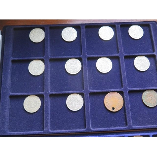 249 - A collection of British and World coins in five trays in a metal carry case