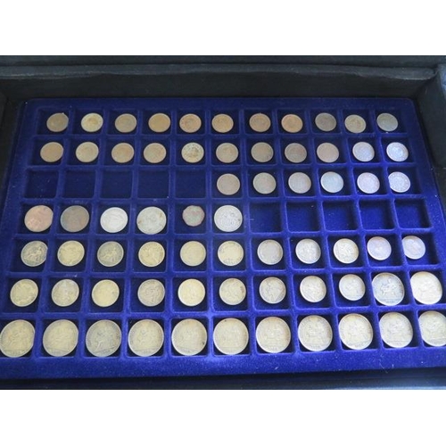 249 - A collection of British and World coins in five trays in a metal carry case