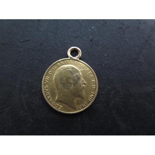 256 - An Edward VII gold half sovereign dated 1906 with a soldered pendant mount