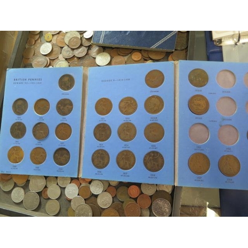 266 - A collection of loose World coinage and three folders, and an album including some bank notes