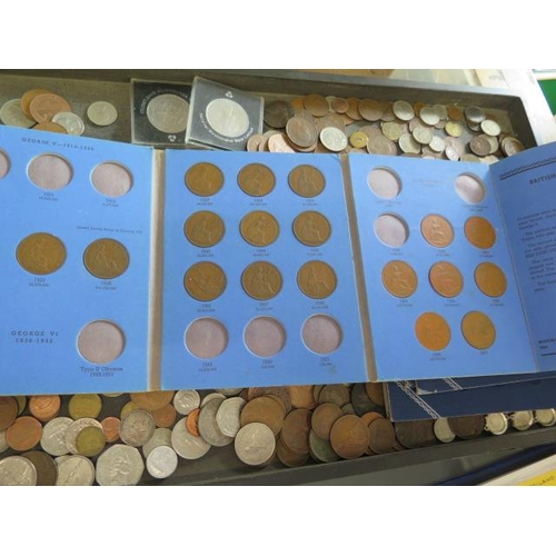 266 - A collection of loose World coinage and three folders, and an album including some bank notes