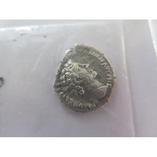 269 - A collection of five Roman coins including Marcus Aurelius Denarius