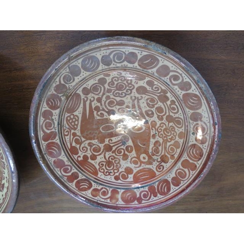 332 - Two Hispano-Moresque ware lustre bowls - 32cm and 40cm diameter - both with old riveted repairs