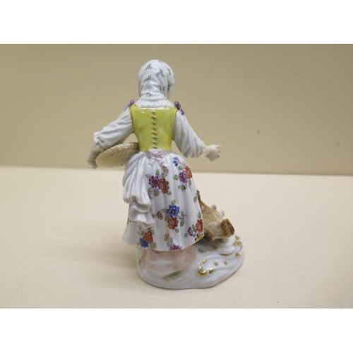 355 - A Meissen group boy Cupid and a young girl - Height 12cm - some foliate chipping to garland otherwis... 