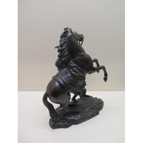 358 - A pair of bronze Marley horses - Height 28cm - both with good patina, one missing a rivet/stay, othe... 