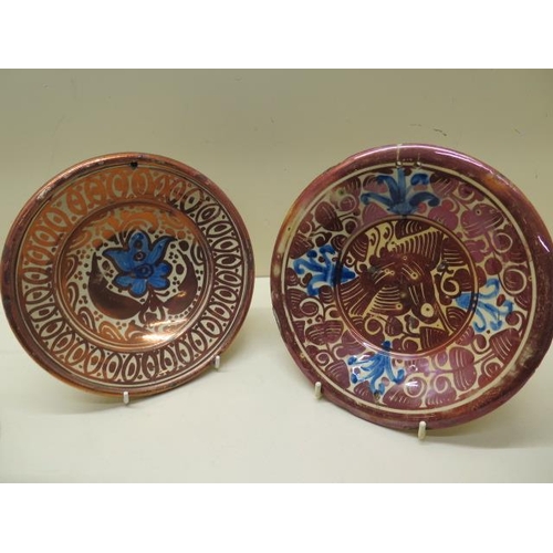 369 - Three Hispano-Moresque type ware plates - Largest 21cm - chips and wear/crack to largest, holes to t... 