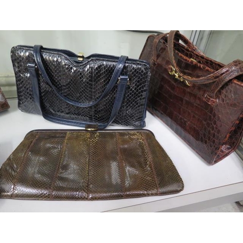 374 - A collection of crocodile/lizard ladies handbags