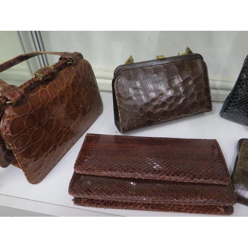 374 - A collection of crocodile/lizard ladies handbags