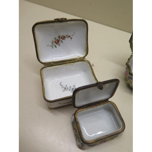 375 - A collection of six continental porcelain hand decorated trinket pill boxes - largest 11cm wide - al... 