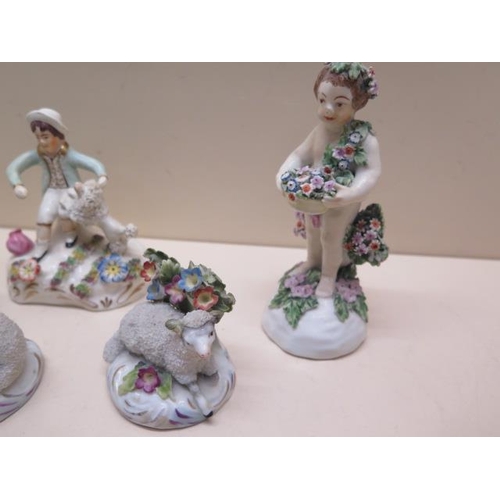 378 - Six 19th century porcelain floral encrusted figures - Tallest 14cm - chipping to 4 figures/restorati... 