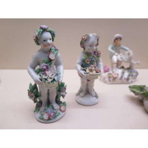 378 - Six 19th century porcelain floral encrusted figures - Tallest 14cm - chipping to 4 figures/restorati... 