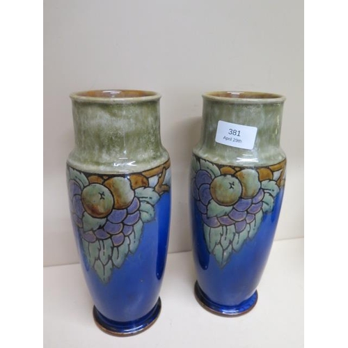 381 - A pair of Royal Doulton Lambeth vases - in good condition - Height 26cm