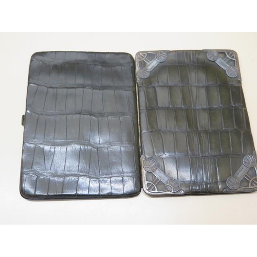 387 - A green crocodile skin card case with silver front corners - 14cm x 10cm - in usable condition