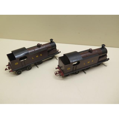 407 - Three early tinplate Marklin OO gauge coaches, two 0-4-4 locos (make unknown) and nine wood and meta... 