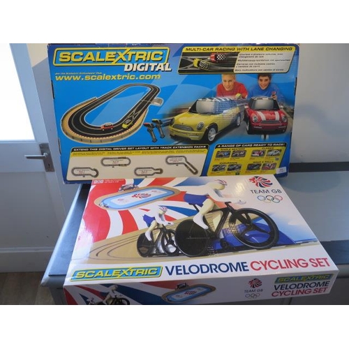 416 - A Scalextric Velodrome boxed cycling set and digital driver boxed set - both look new