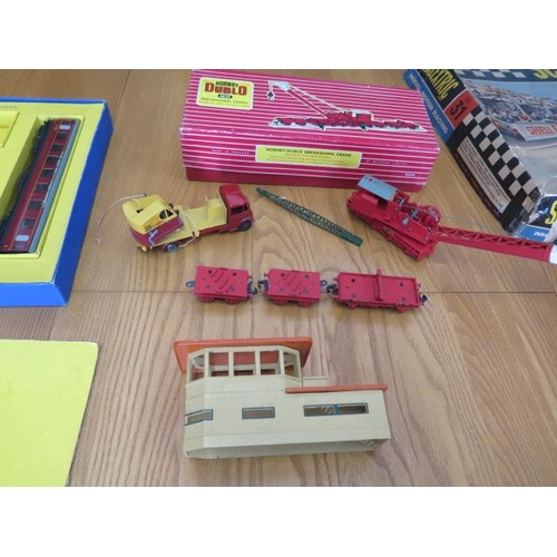 419 - A part Scalextric set, Hornby train set and crane