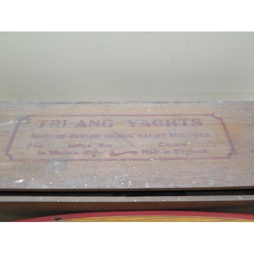 421 - A Tri-ang wooden pond yacht - Shamrock - 53cm long with original box - crack to keel, otherwise gene... 