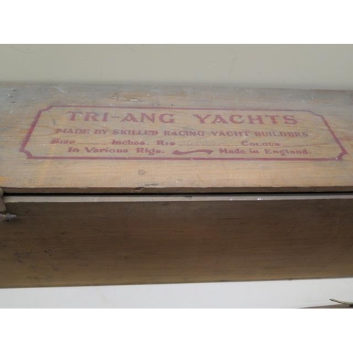 422 - A Tri-ang wooden pond yacht - Britannia - 53cm long with original box - crack to keel, otherwise gen... 