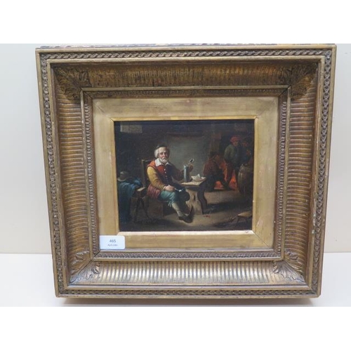 465 - A 19th century oil on canvas of a man drinking in a village inn - in a gilt frame - 40cm x 37cm - ov... 