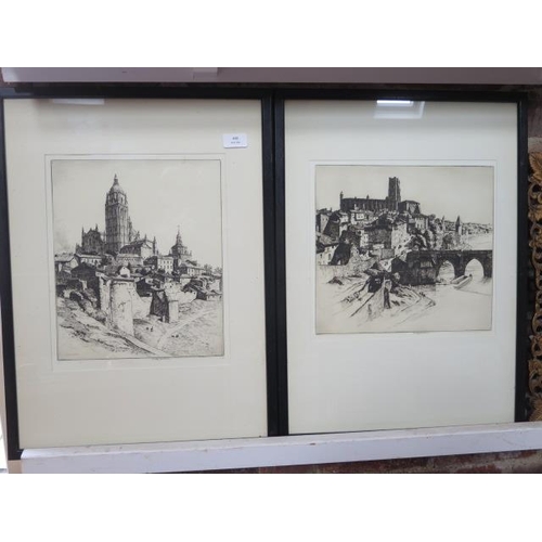 466 - A pair of Stanley Anderson signed etchings in ebonised frames - 59cm x 43cm overall