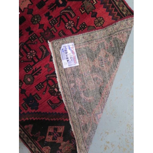 506 - A handmade Persian runner - in good condition - 290cm x 83cm