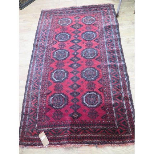 509 - A vintage handmade rug - 187cm x 114cm