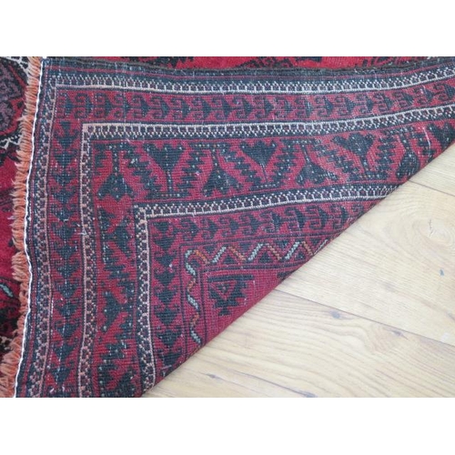 509 - A vintage handmade rug - 187cm x 114cm