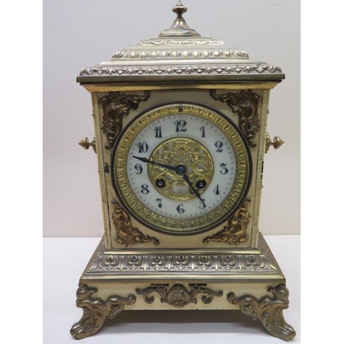 531 - A 19th century 8 day mantle clock with an attractive painted tin and ormolu case striking on a bell ... 