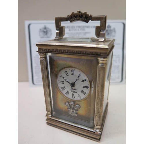 532 - A miniature carriage clock by Charles Frodsham in its original box - Height 19cm - not working