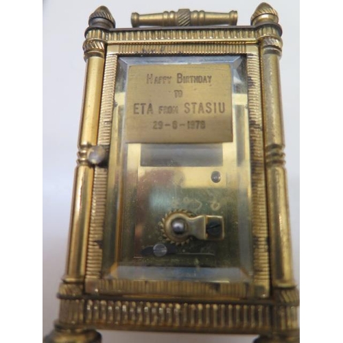 533 - A brass hexagonal carriage clock - Height 12cm with handle down in original case with a spider key -... 