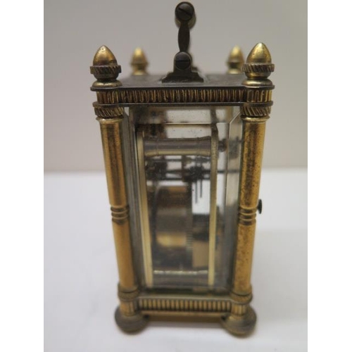 534 - A good quality miniature carriage clock in a brass engraved case and dial - in working order - 10cm ... 