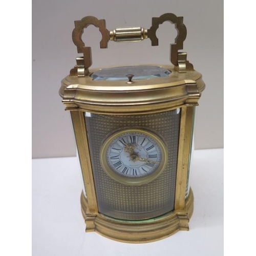 535 - A brass carriage clock striking on a gong - Height 16cm - working in saleroom