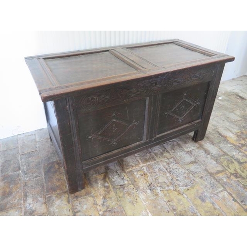 544 - An 18th century carved oak coffer - Width 105cm x Height 56cm x Depth 50cm