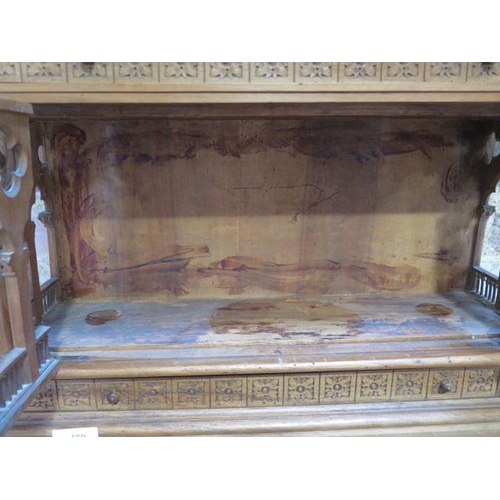 559 - An interesting carved wooden Ecclesiastical wall display cabinet with two drawers and two doors - He... 