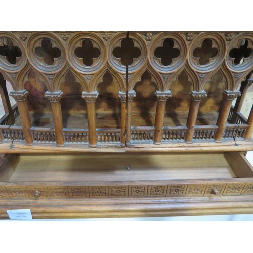 559 - An interesting carved wooden Ecclesiastical wall display cabinet with two drawers and two doors - He... 