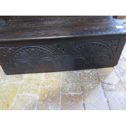 589 - An 18cth century carved oak box - Width 19cm x Depth 48cm x Height 24cm