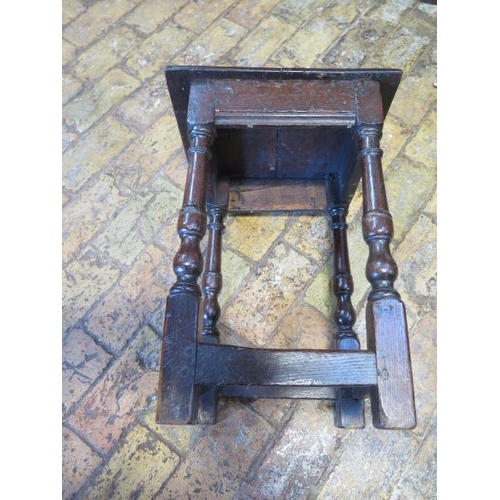 590 - An 18th century oak joint stool with a nice patina - Height 53cm x Width 39cm