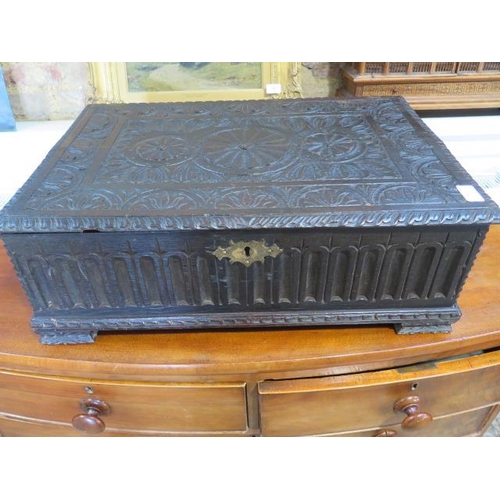 591 - An 18th century carved oak box - Width 60cm x Depth 42cm x Height 22cm - good condition for its age