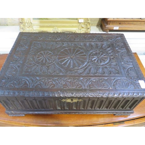 591 - An 18th century carved oak box - Width 60cm x Depth 42cm x Height 22cm - good condition for its age