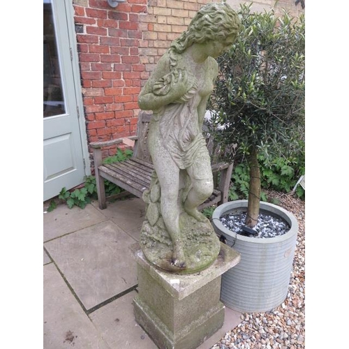 632 - A stone effect classical style statue on a base - Height 156cm