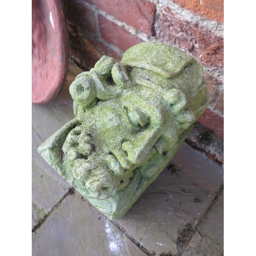 661 - A large cast stone corbel of a King marked 1957 E Ros - Width 18cm x Depth 38cm