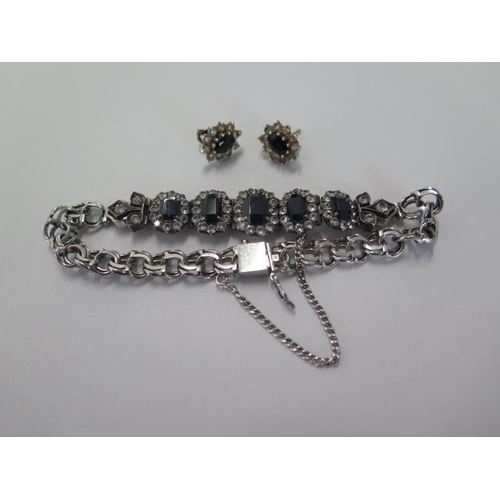 67 - A yellow metal blue stone and white stone part bracelet with a later added sterling silver bracelet ... 