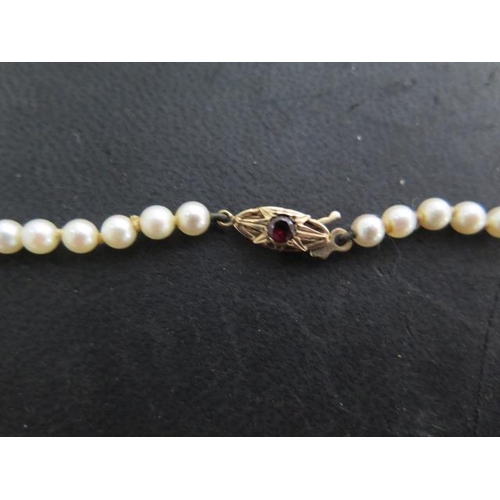 78 - A cultured pearl necklace consisting of 118 cultured Akoya pearls, plain strung and graduating in si... 