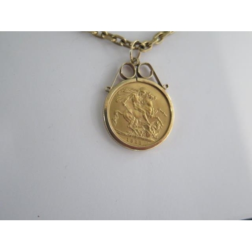 83 - A George V full gold sovereign dated 1915 in a 9ct pendant mount on a 58cm chain - total weight appr... 