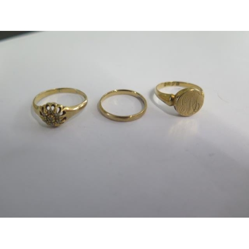 88 - Three 18ct yellow gold rings - sizes K, O, Q - total weight approx 7.5 grams