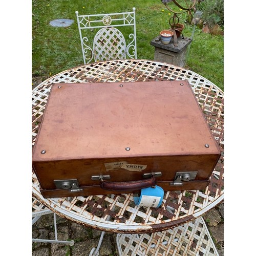 152A - An Antique tan leather Drew & Sons of Piccadilly traveling suitcase with dark green leather interior... 