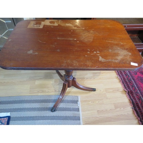 565 - A 19th century mahogany side table with a rectangular top