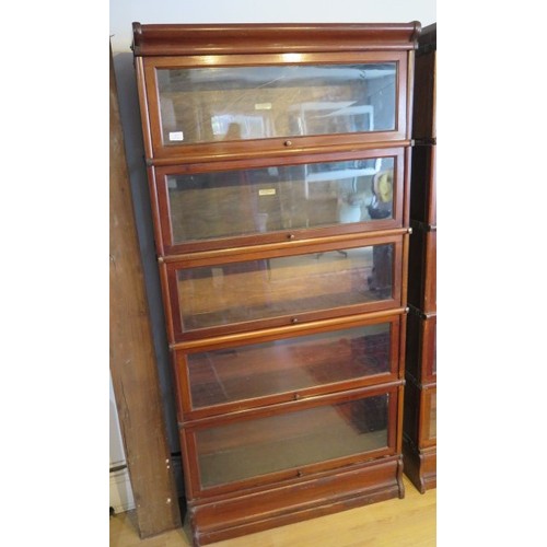 597 - A mahogany five section glazed Globe Wernicke stacking bookcase, two sections with labels, one secti... 